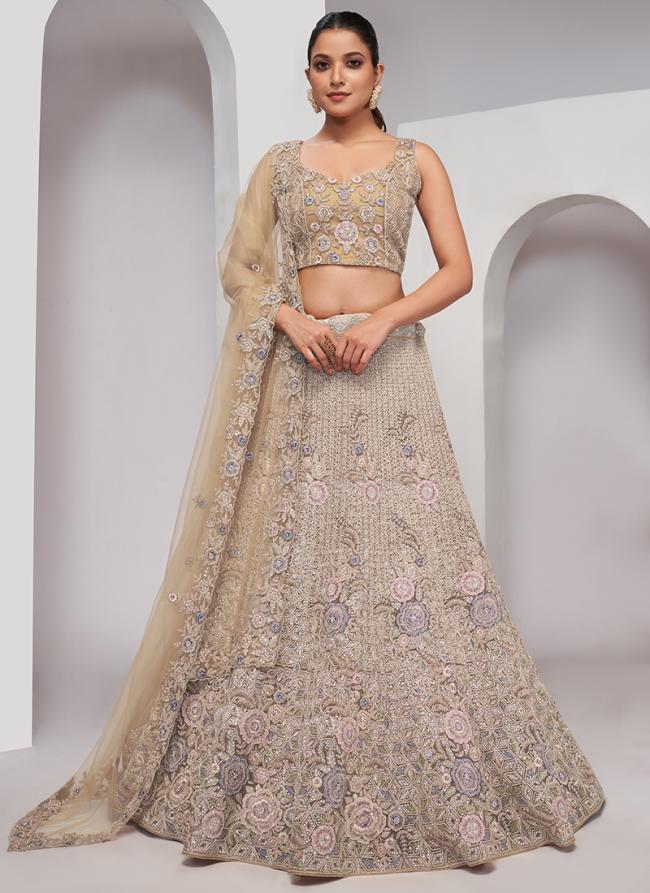 Soft Net Beige Wedding Wear Sequins Work Lehenga Choli